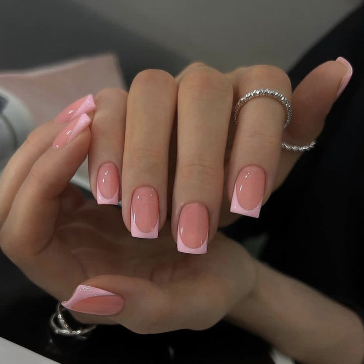 Nail set with elegant French tip and sparkling accents Bowlift