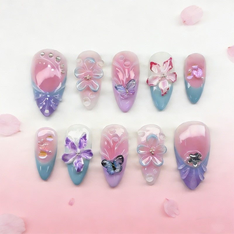 Artificial nail set with maritime motifs and colorful accents Bowlift