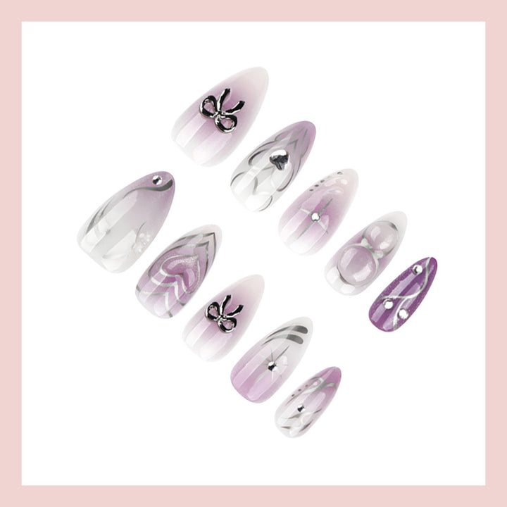 Nail art set with elegant flower and glitter accents Bowlift