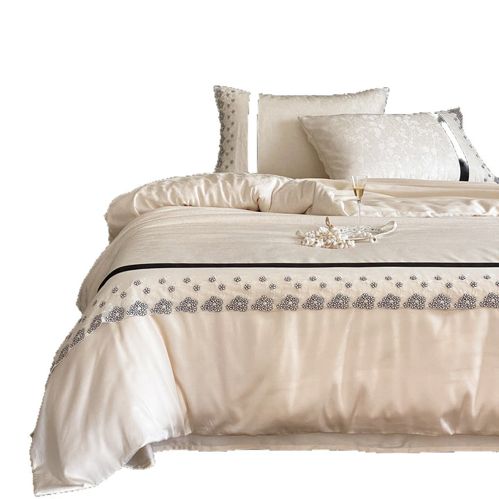Luxury satin bedding with floral embroidery border and satin edges