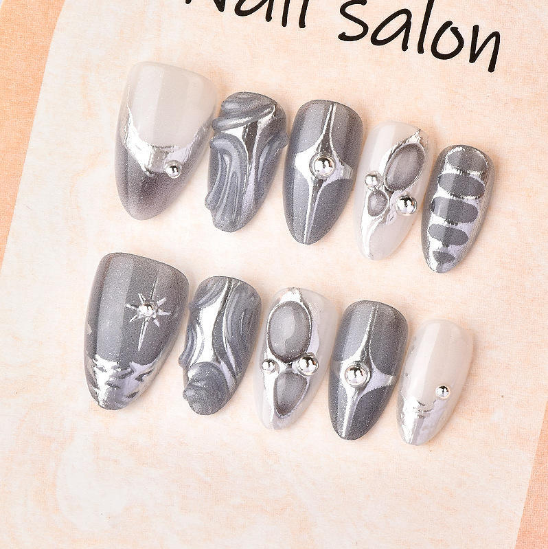 Acrylic nail set with elegant decorations Bowlift