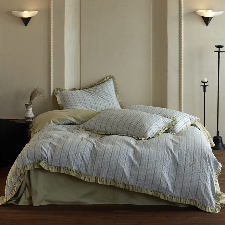 Luxurious cotton bedding set with ruffled trim and pillowcases