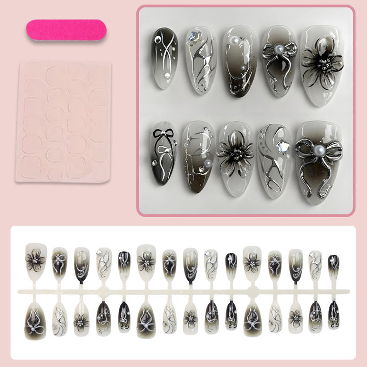 Artificial nails with elegant floral and glittering decorations Bowlift