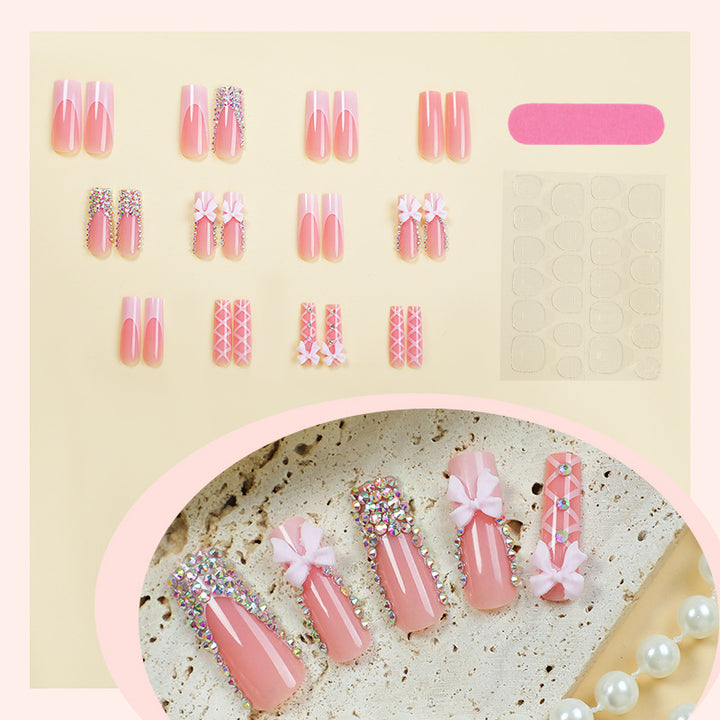 Artificial nail set with elegant bow and glitter accents Bowlift