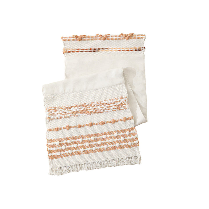 Woven cotton table runner with fringes and textured pattern Bowlift