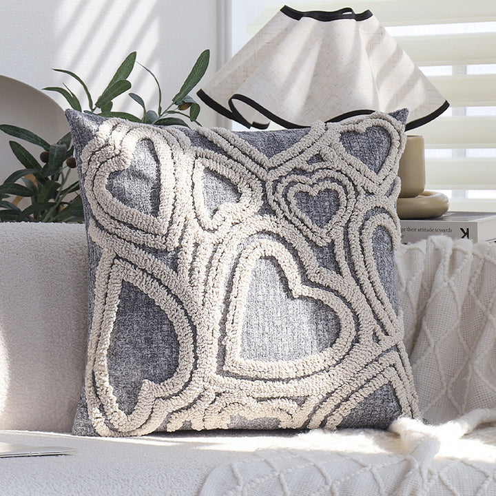 Square cushion cover with three-dimensional looped heart relief made of soft bouclé mix Bowlift