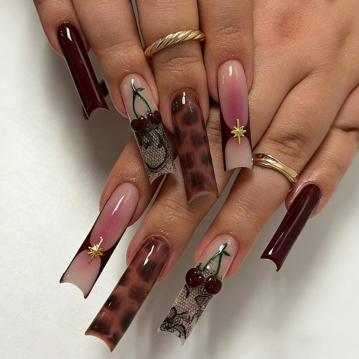 Artificial nail set with creative designs and glitter Bowlift