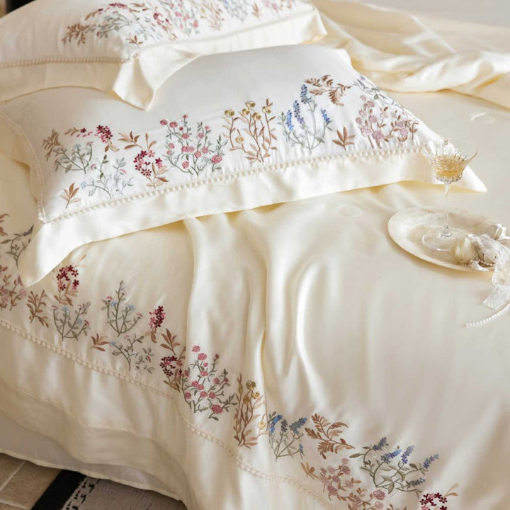 Exclusive satin bed linen set with fine floral embroidery and silky finish