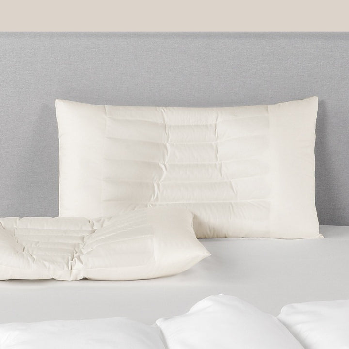 Ergonomic neck and side sleeper pillow with supportive contour