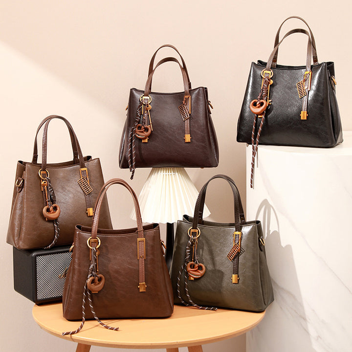 Structured Handheld Satchel Bag with Decorative Keychain