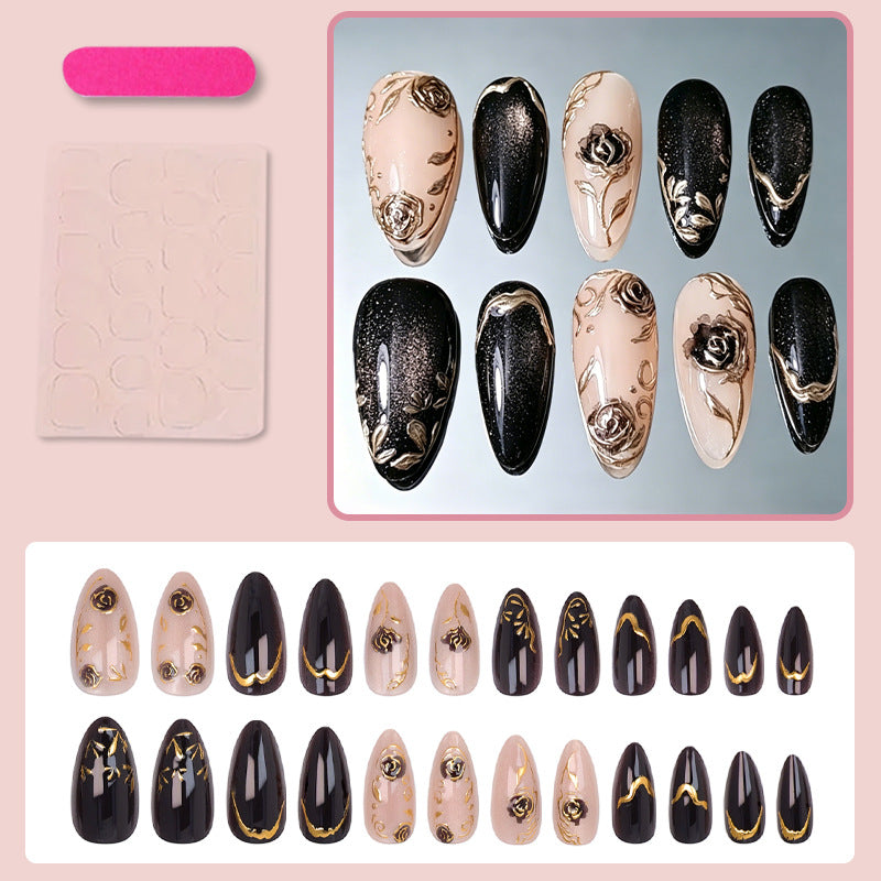Nail set with elegant gold embellishments and original patterns Bowlift