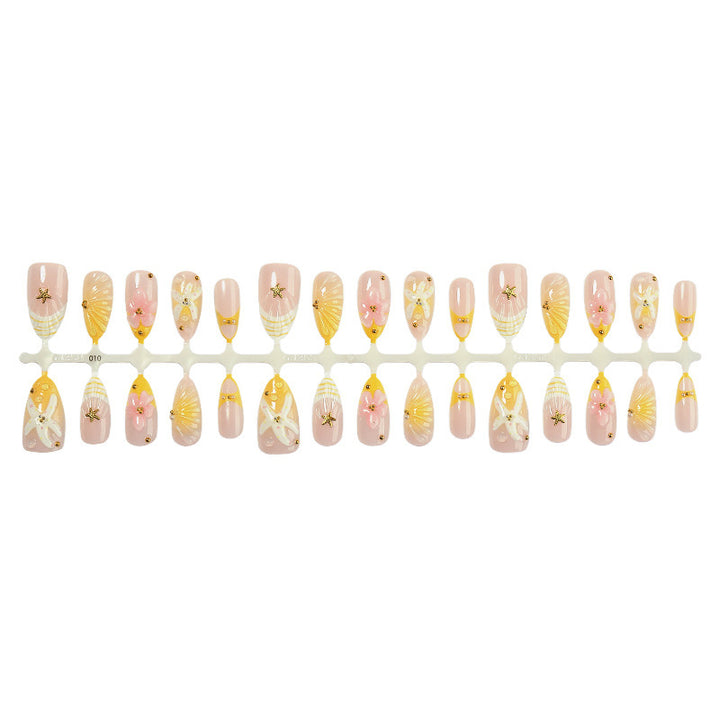 Artificial nail set with floral and maritime accents Bowlift
