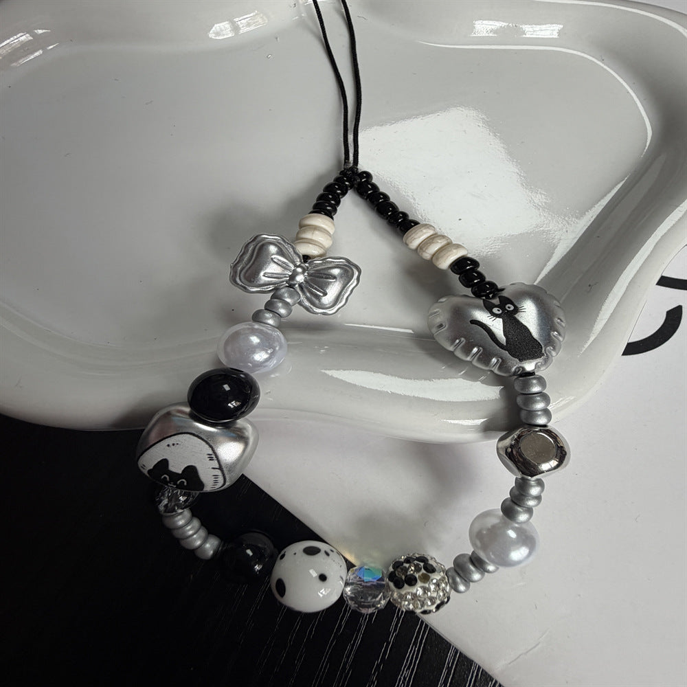 Beaded Eyewear Accessory Bowlift