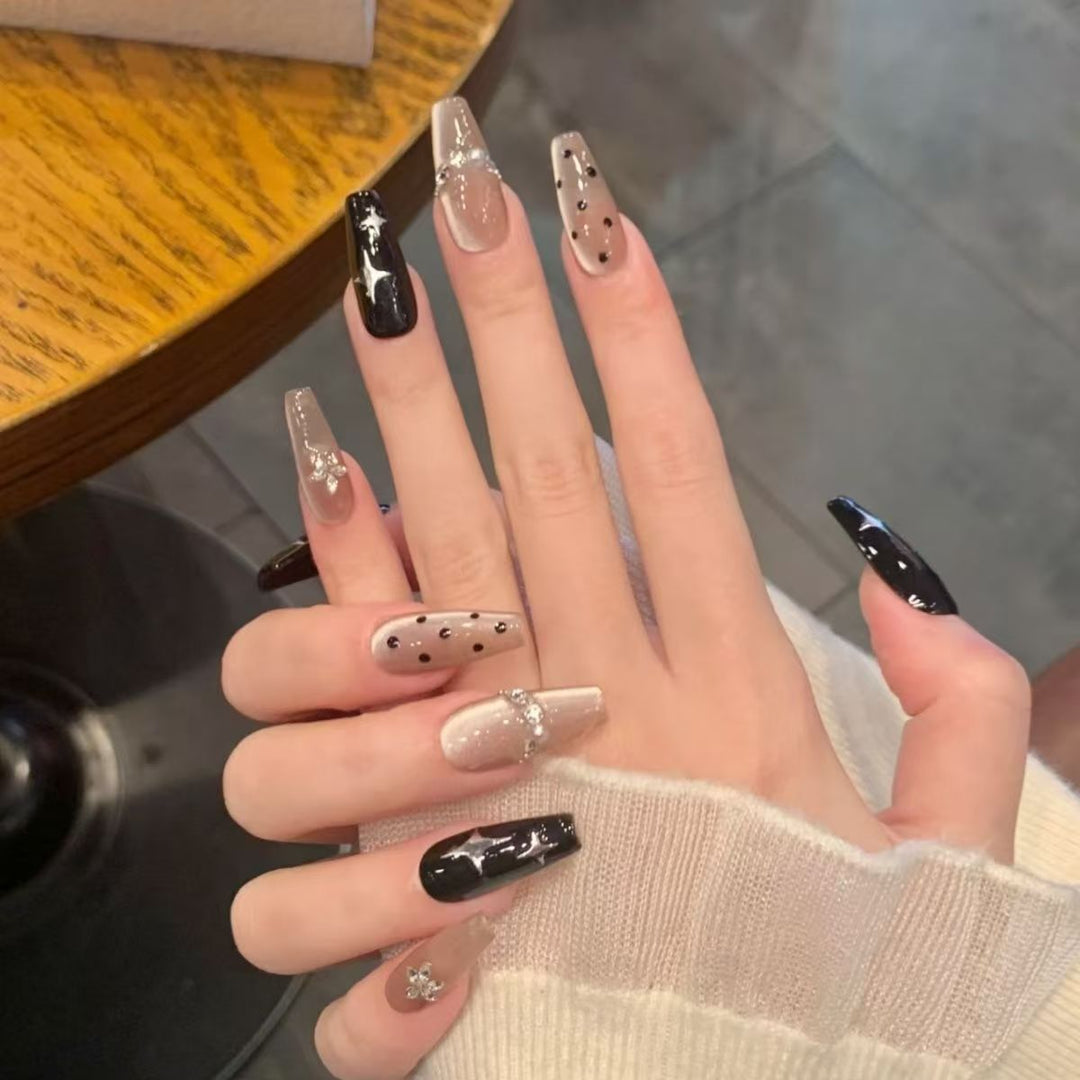 Stylish Press-On Nail Extensions with Decorative Accents