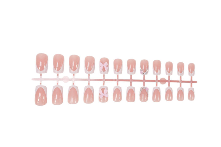 Artificial nail set with elegant bow and glitter designs Bowlift