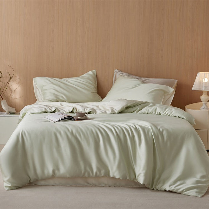 Luxurious cotton satin bedding set with a silky-matte feel, reversible function, and fine piping
