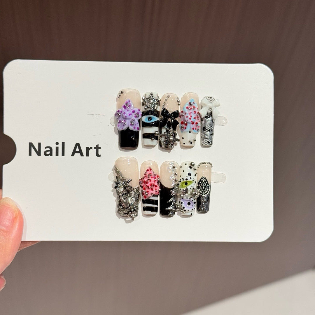 Artistic Press-On Nail Set with Unique Design Elements