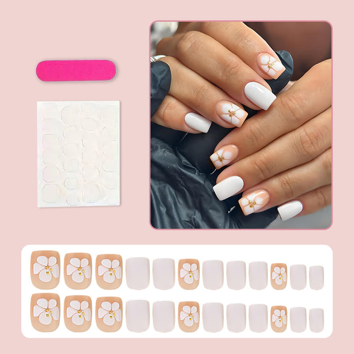 Artificial nail set with luxurious flower design and subtle gold accents Bowlift