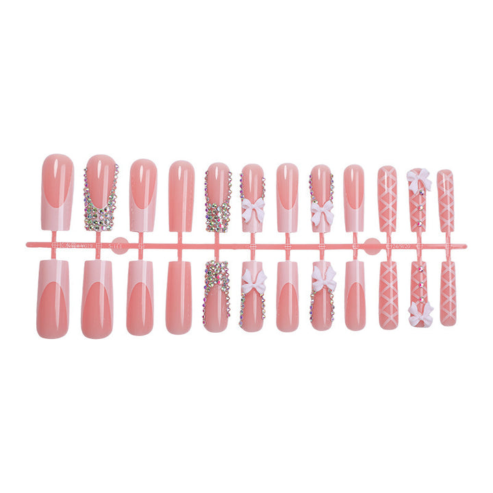 Artificial nail set with elegant bow and glitter accents Bowlift