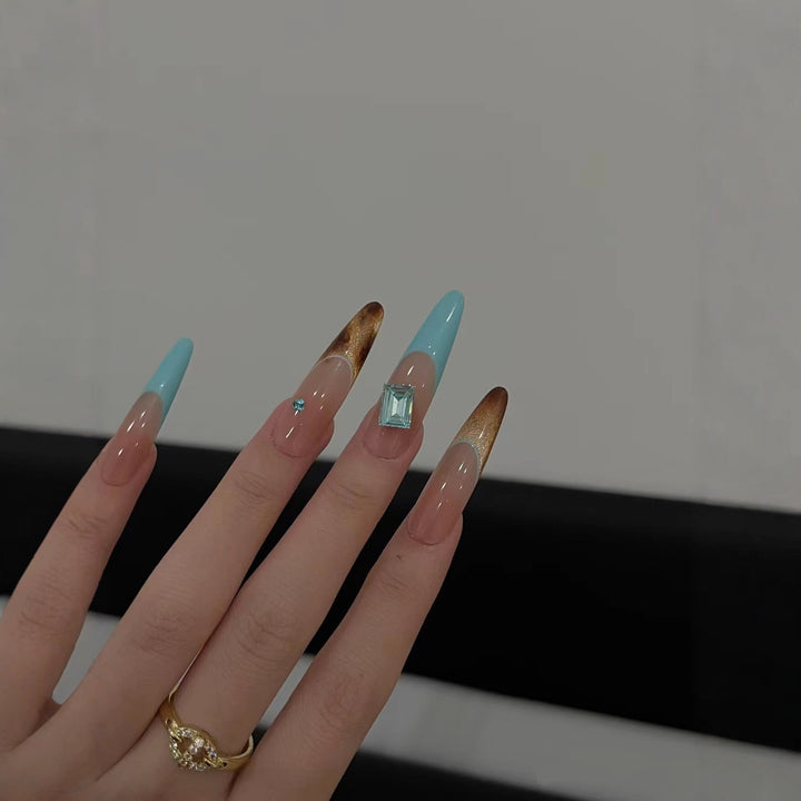 Elegant Stiletto Nail Extensions with Glitter Accents
