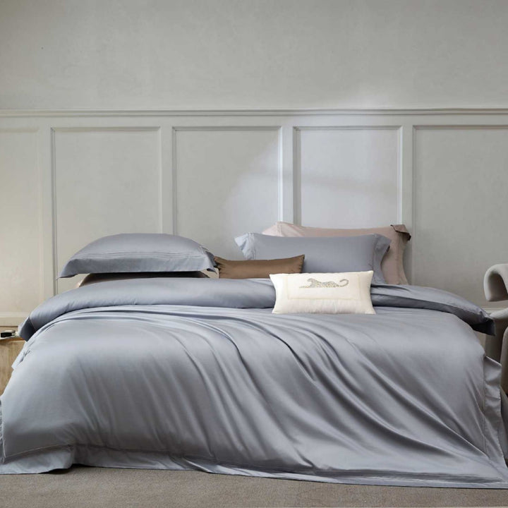 Luxurious multi-piece satin bedding set with hotel closure