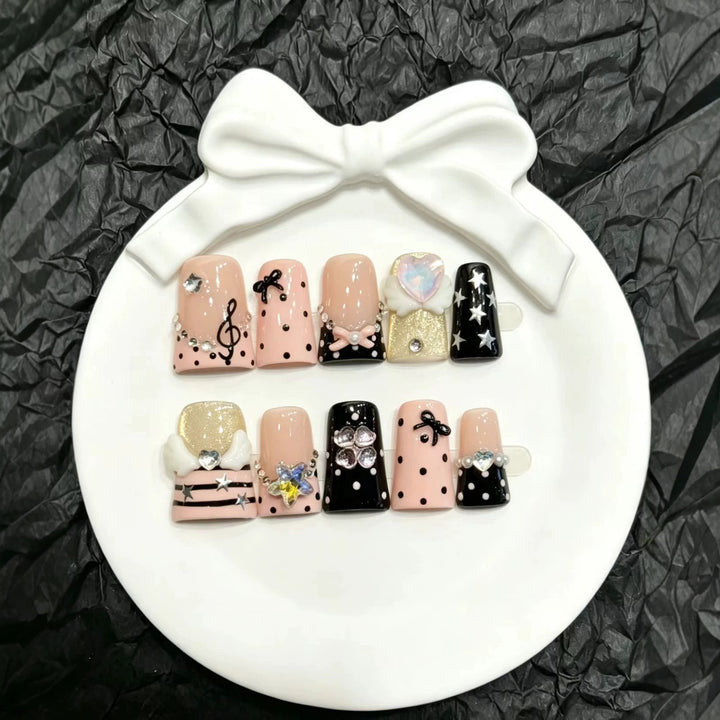 Decorative Press-On Nail Art Set with Unique Charms