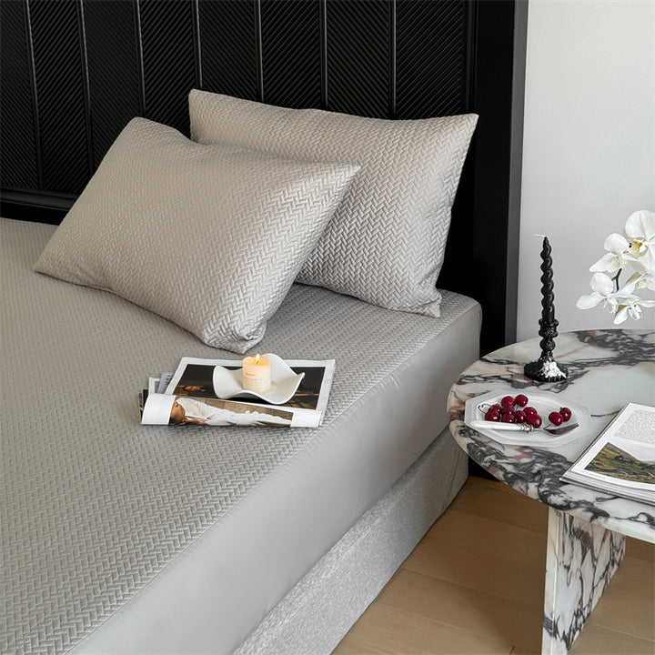 Comfort mattress topper with textured waffle surface and deep edge