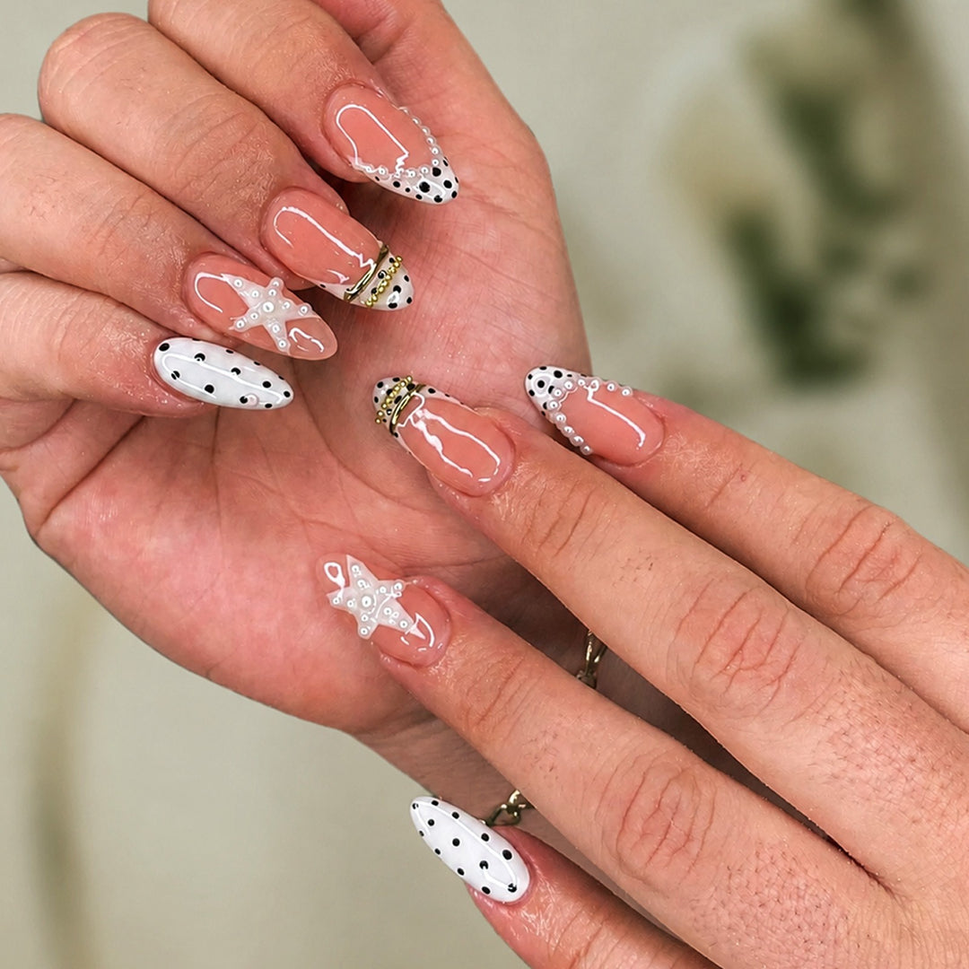 Nail set with elegant pearl and dot accents Bowlift