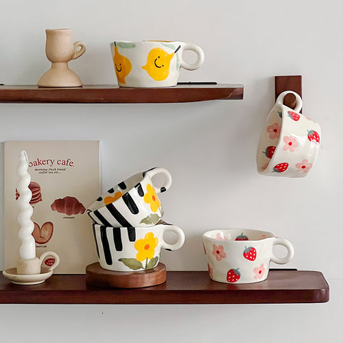 Ceramic mug with hand-painted penguin pattern