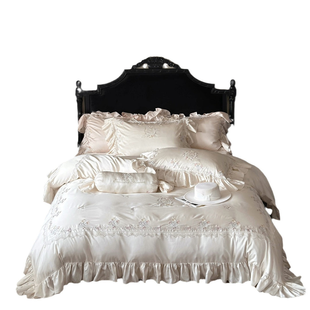 Romantic satin bedding set with ruffles, embroidered flowers, and flounce