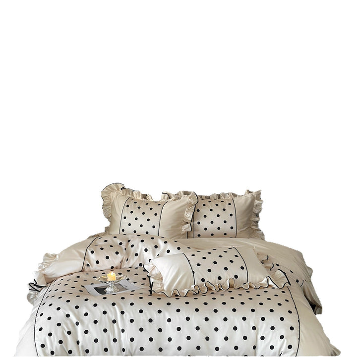 Luxurious satin bedding set with polka dot design, ruffle and contrast piping