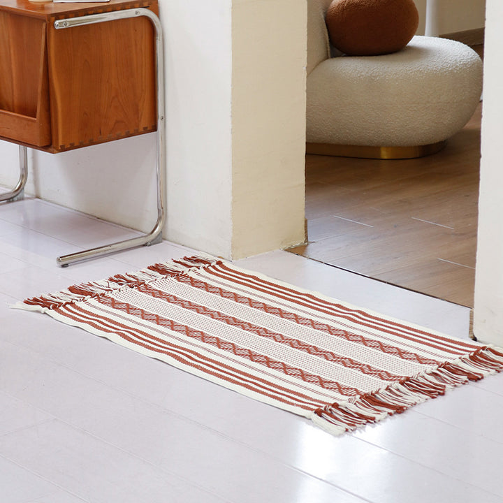 Flat-woven cotton runner with fringes and graphic ethnic stripe pattern Bowlift
