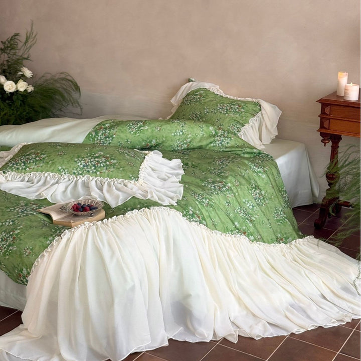 Romantic bed linen set with ruffled hem and floral lightweight fabric look