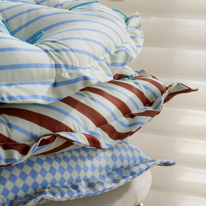 Heart-shaped floor cushion with quilted tufted upholstery and checkered satin cover Bowlift