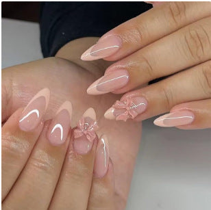 Artificial nail set with elegant tips and romantic bow decorations Bowlift