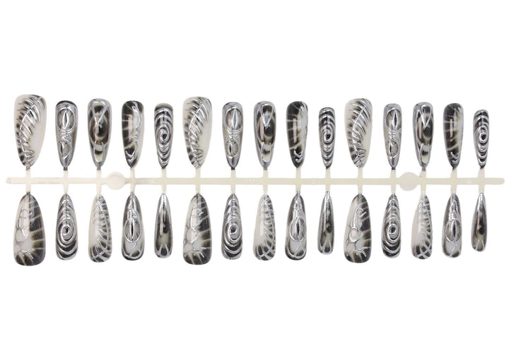 Artificial nail set with modern spiral pattern and shiny accents Bowlift