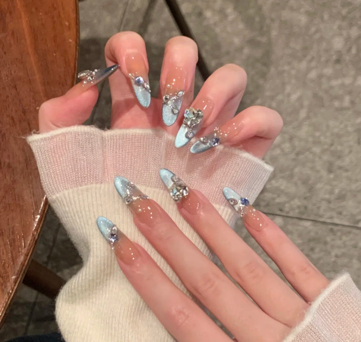 Artistic Press-On Nail Extensions with Floral Embellishments Bowlift