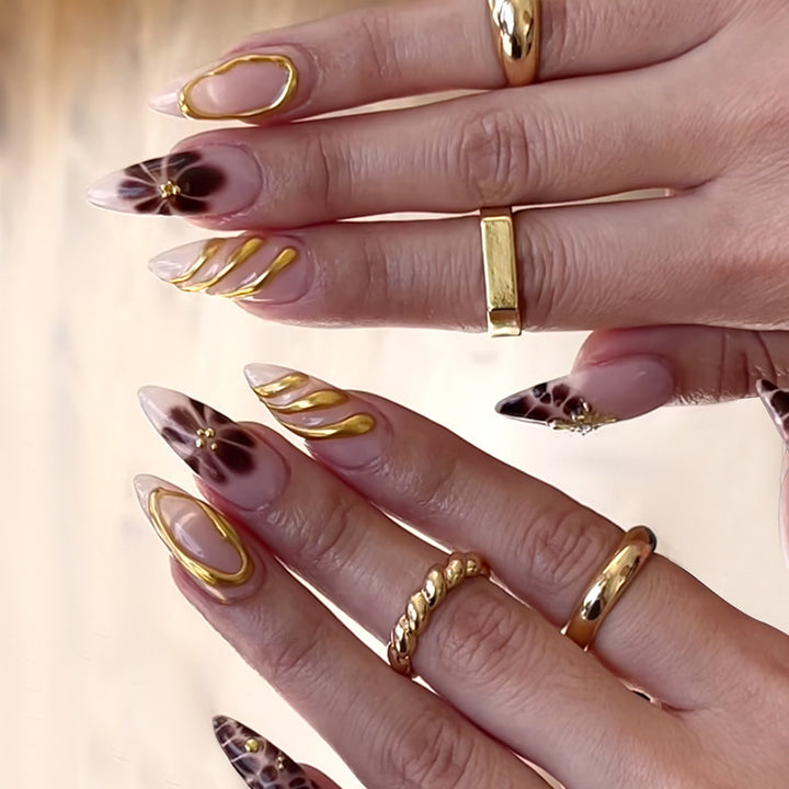 Artificial nail set with elegant flower and gold accents Bowlift