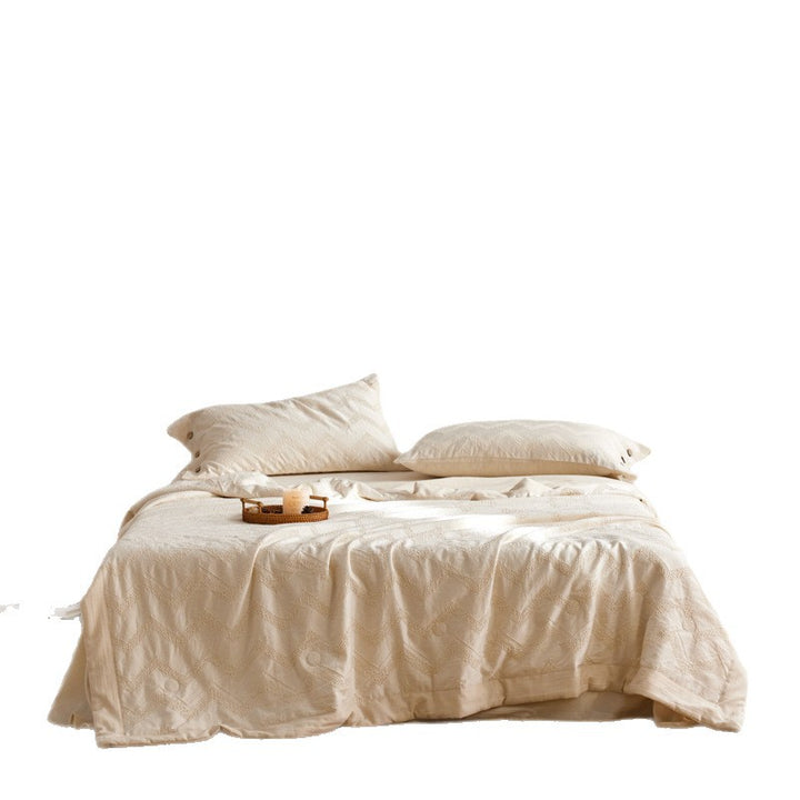 Cotton bedding set with textured zigzag embroidery and wooden button closure
