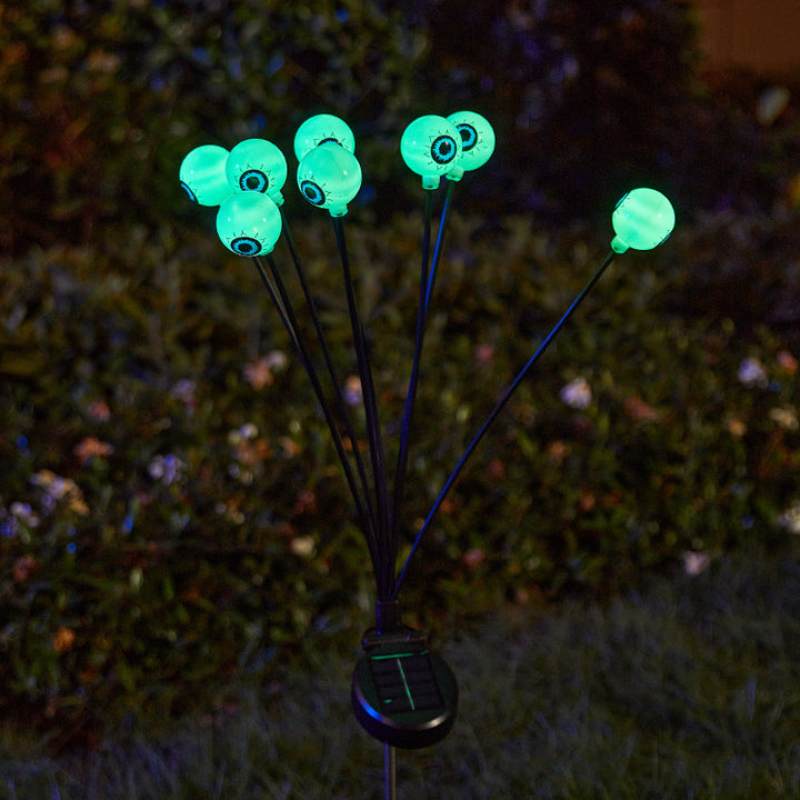 Creepy garden lights with eye motif Bowlift