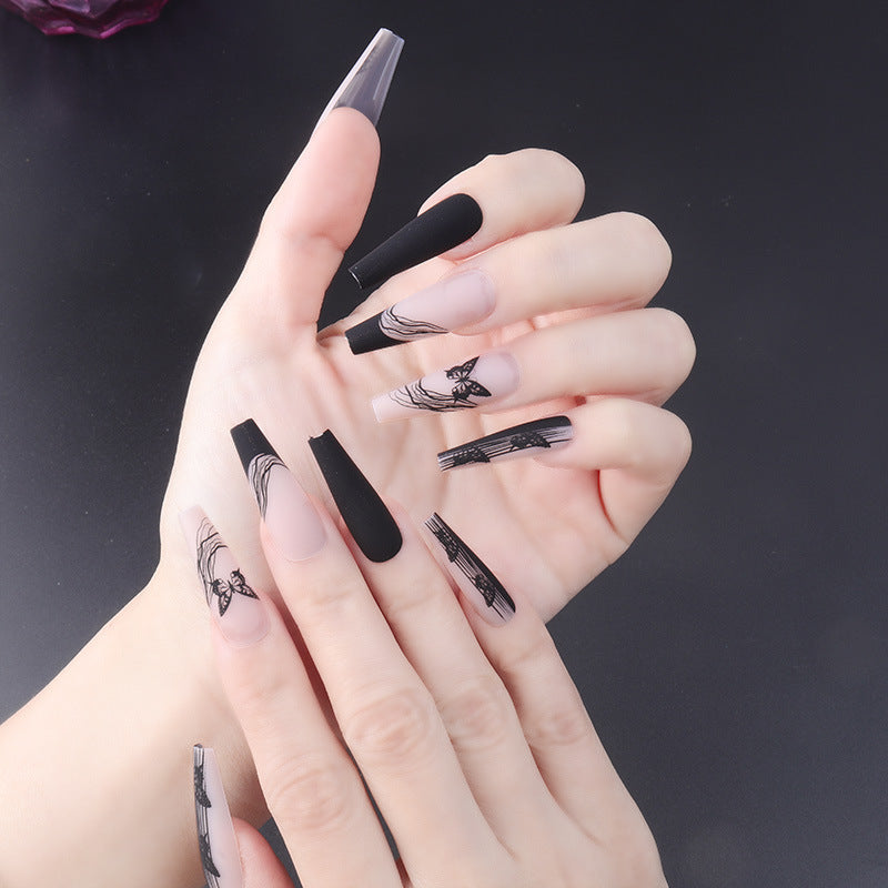 Artistic Press-On Nail Set with Intricate Patterns Bowlift