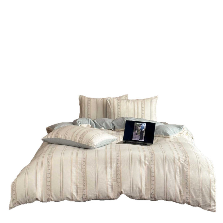 Reversible cotton bedding set with fine stripe and ethnic pattern