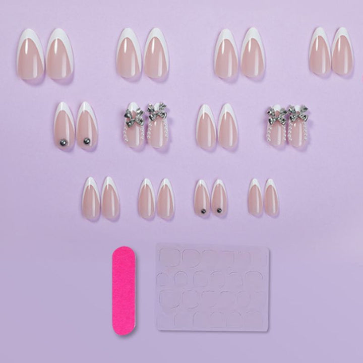 Artificial nail set with elegant French tips and decoration accents Bowlift