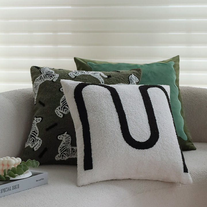 Square decorative cushion cover in teddy bouclé with raised zebra tuft appliqué Bowlift
