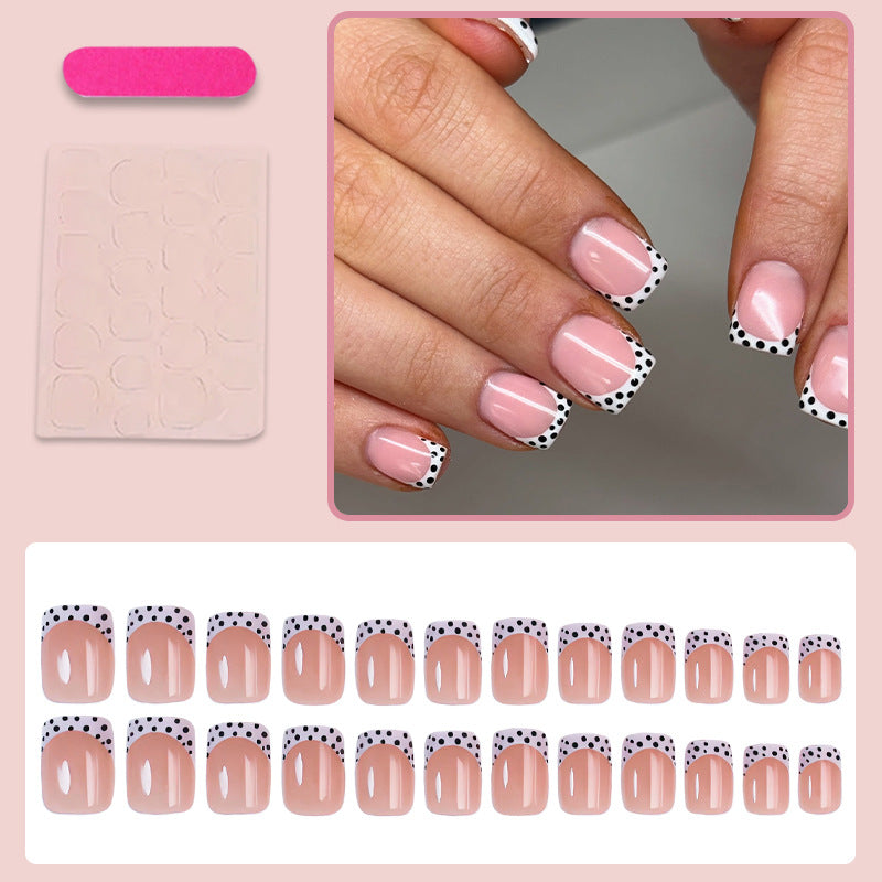 Artificial nail set with elegant dots and high-gloss accents Bowlift