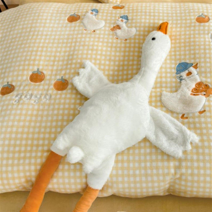 Children's bedding set with embroidered duck and fruit appliqués in checkered pattern