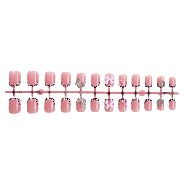 Artificial nail art with embellishments Bowlift