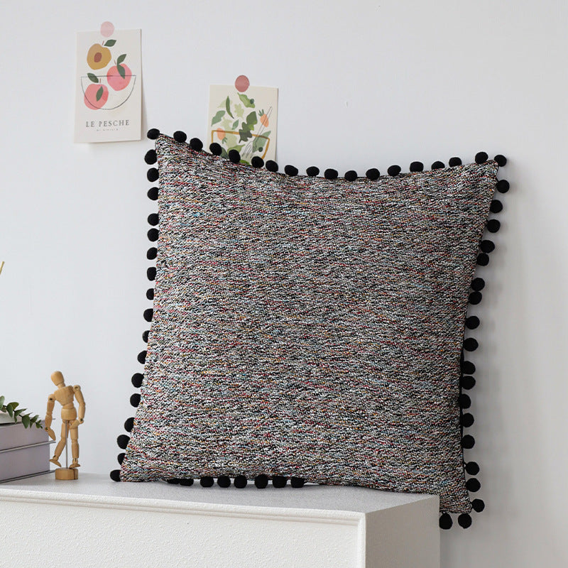 Square cushion cover with pompom trim and mottled boucle structure Bowlift