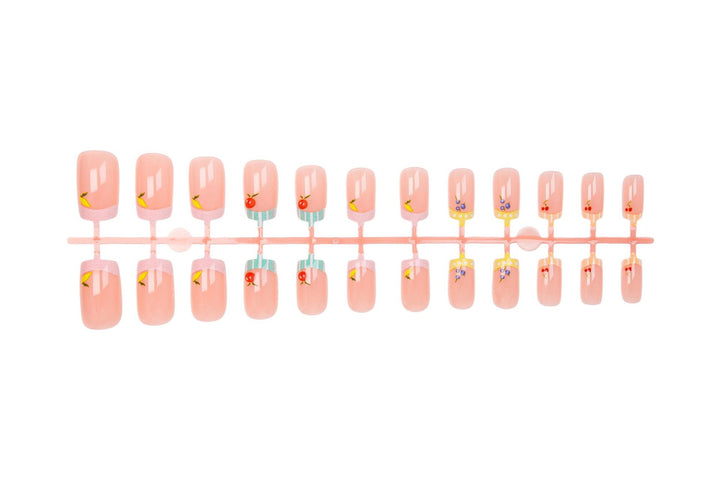 Nail art set with cheerful fruit designs and colorful accents Bowlift