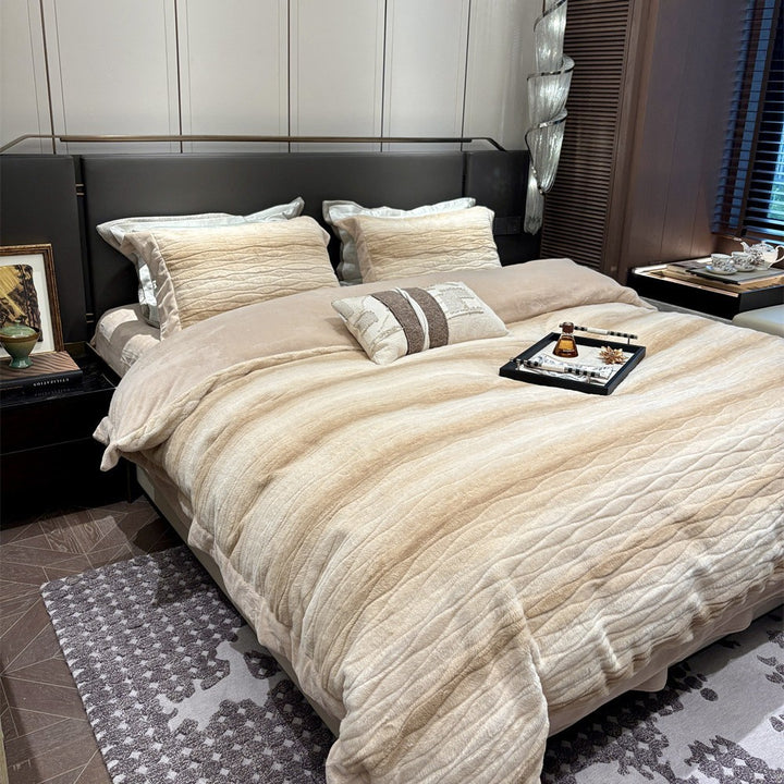 Luxurious quilted reversible bedding set with velvet-like microfiber surface
